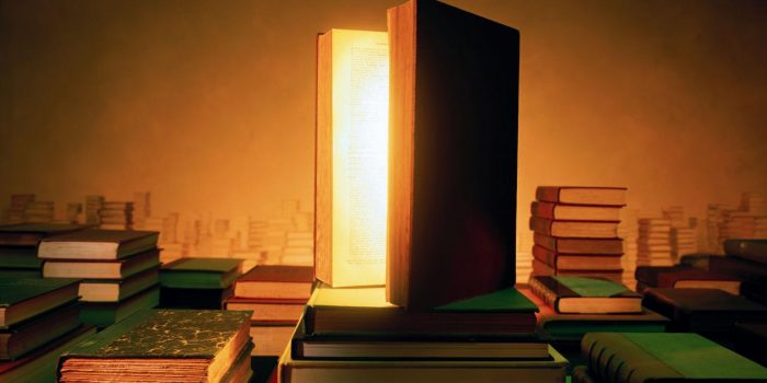 LIGHT SHINING FROM OPEN BOOK
